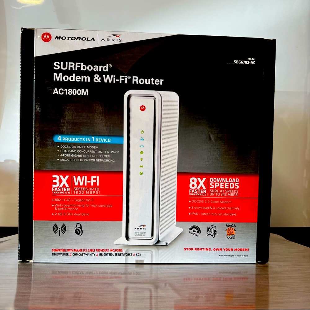 Motorola/Arris 
SURFboard® Cable Modem & Wi-Fi® Router
Excellent condition